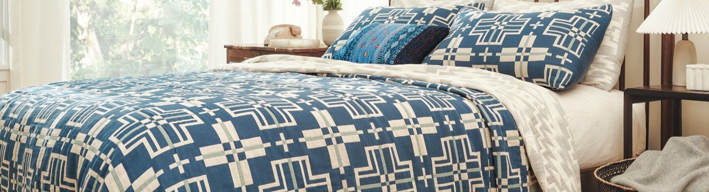 San Marcos Matelasse in Blue on Bed