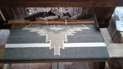 Oaxacan weaving loom showing the Shining Star rug