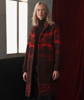 Woman wearing a Crown Point Archive Coat