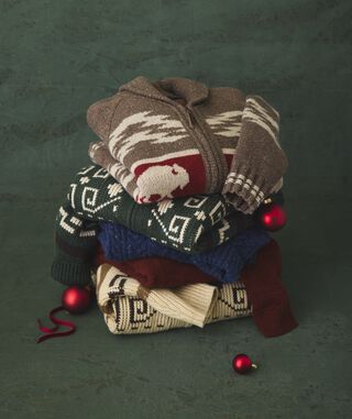 Stack of Mens Giftable Sweaters