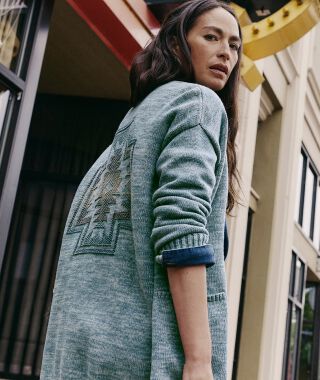 Woman outside wearing a Pendleton sweater