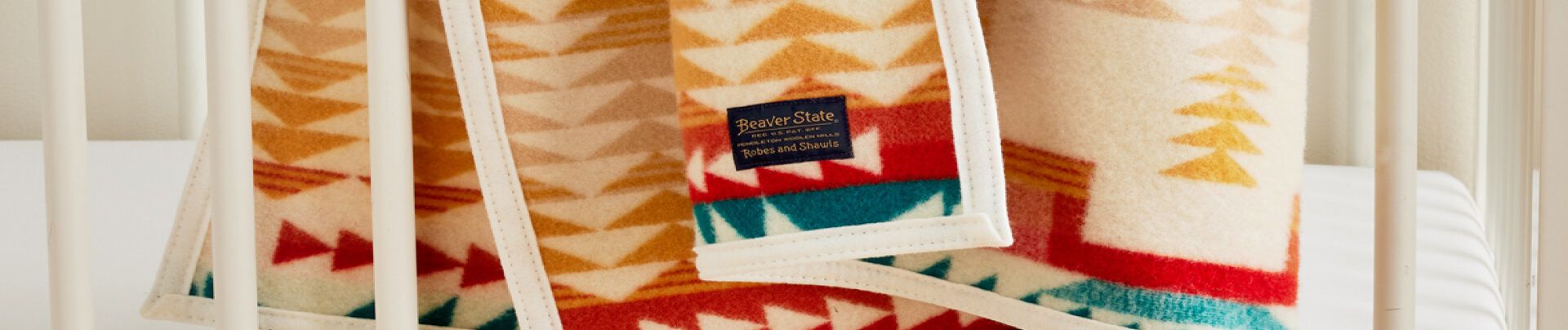 Close up of Shared Paths Crib Blanket