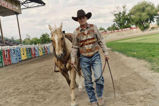 Rodeo Rider walking his horse wearing a Pendleton Wool Western Vest