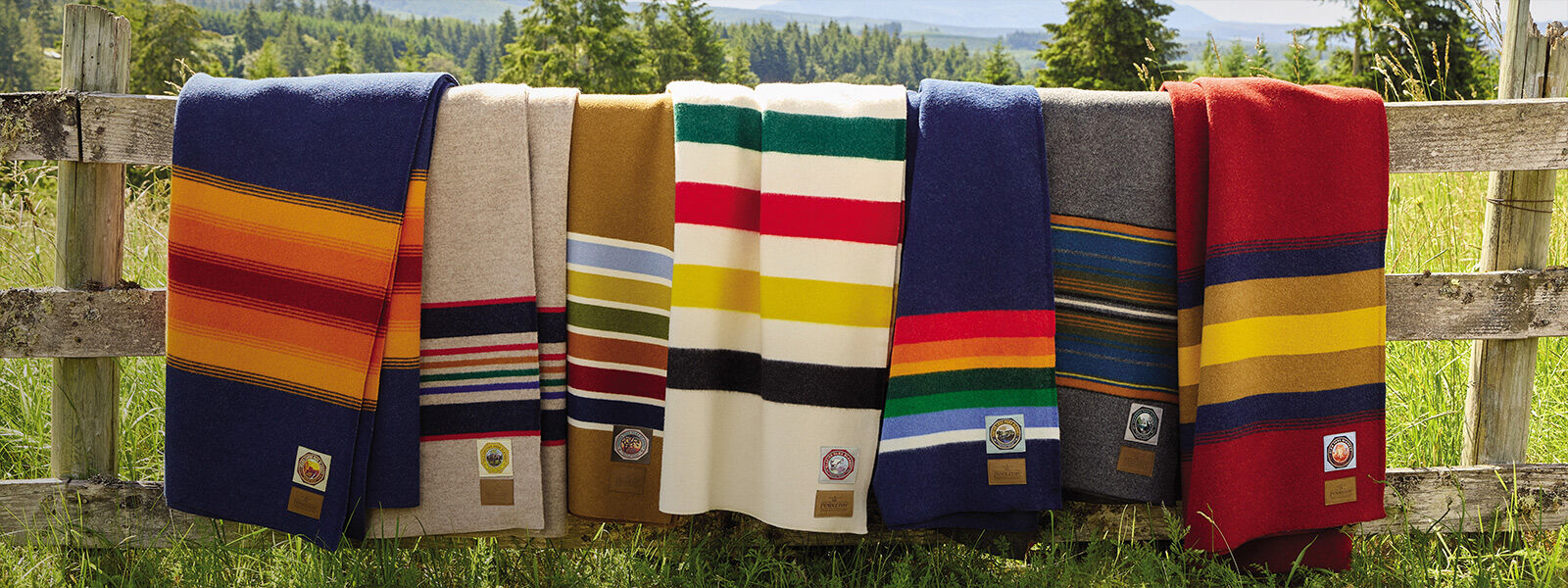 Colorful Pendleton National Park Blankets hanging on a fence